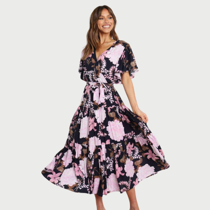 Floral wrap dress in midi length with flutter sleeves