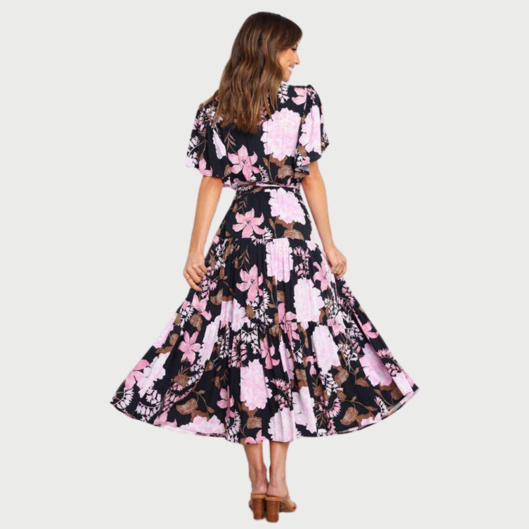 Floral wrap dress in midi length with flutter sleeves