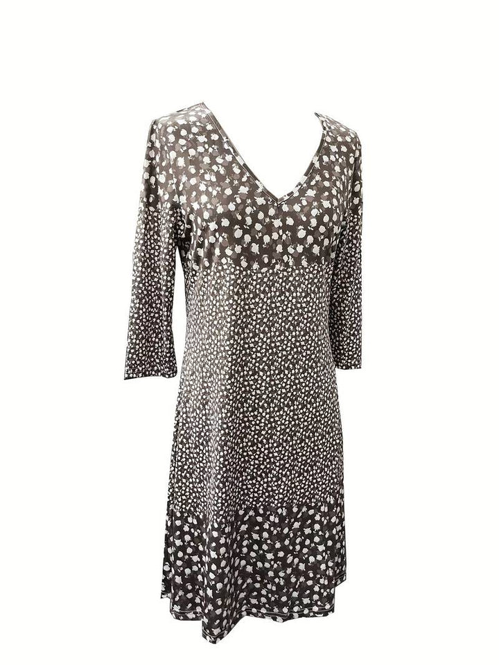 Dotted V-neck dress with floral print