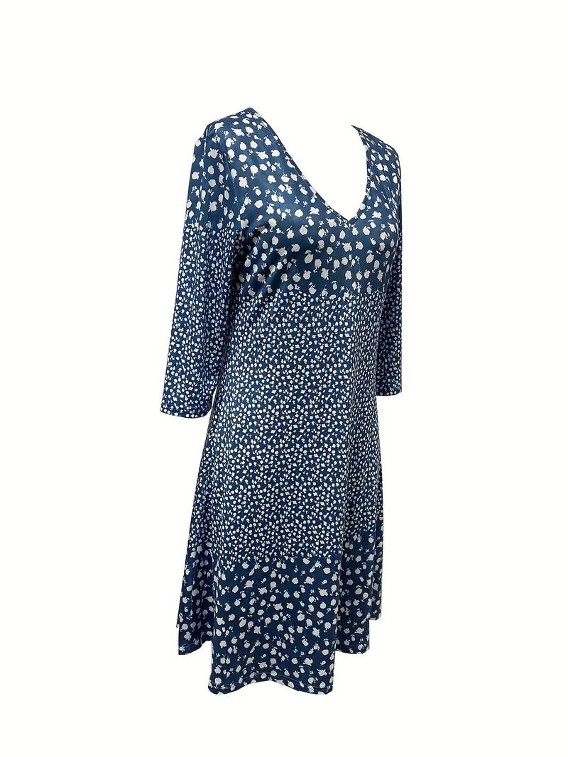 Dotted V-neck dress with floral print