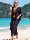 Elegant retro beach dress with V-neckline