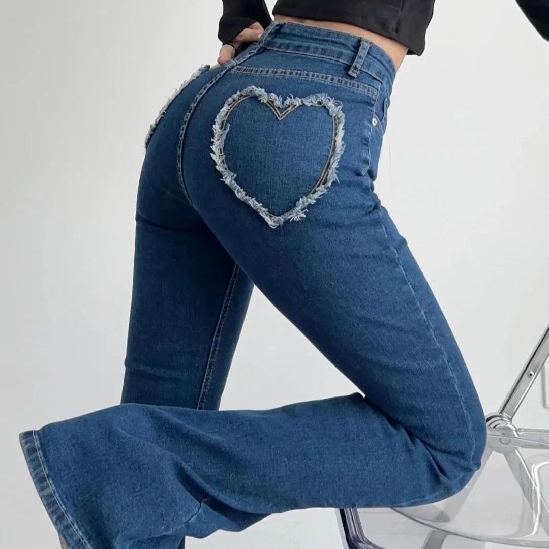 Stylish high-waisted jeans with heart-shaped fringe detail