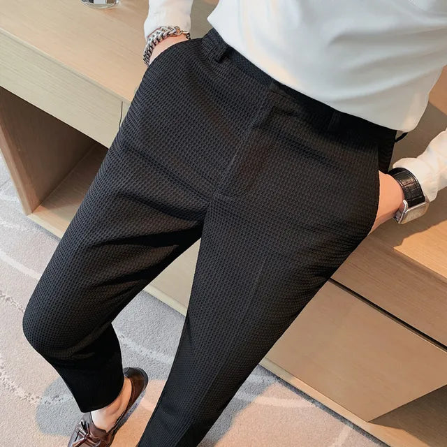 Slim-fit trousers with a subtle checked pattern