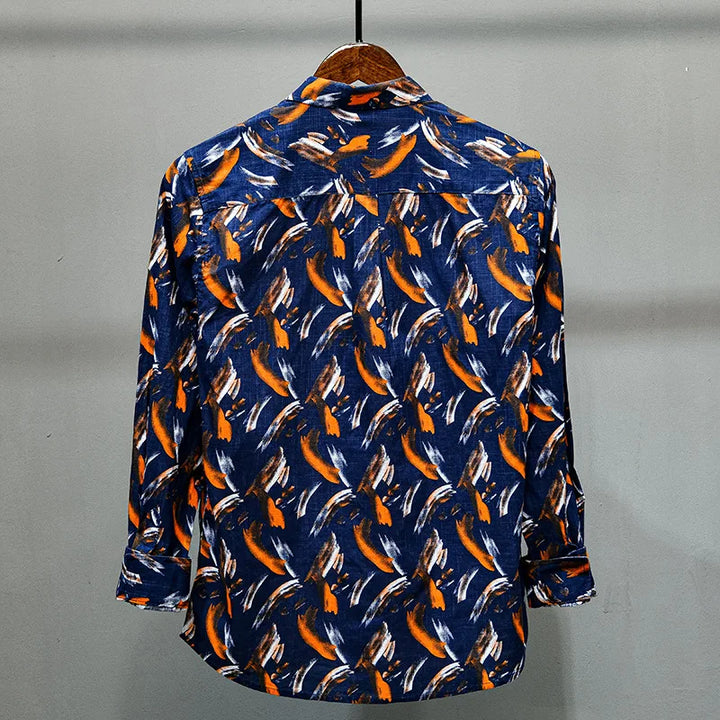 Shirt with turn-down collar and striking feather print