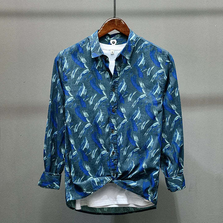 Shirt with turn-down collar and striking feather print