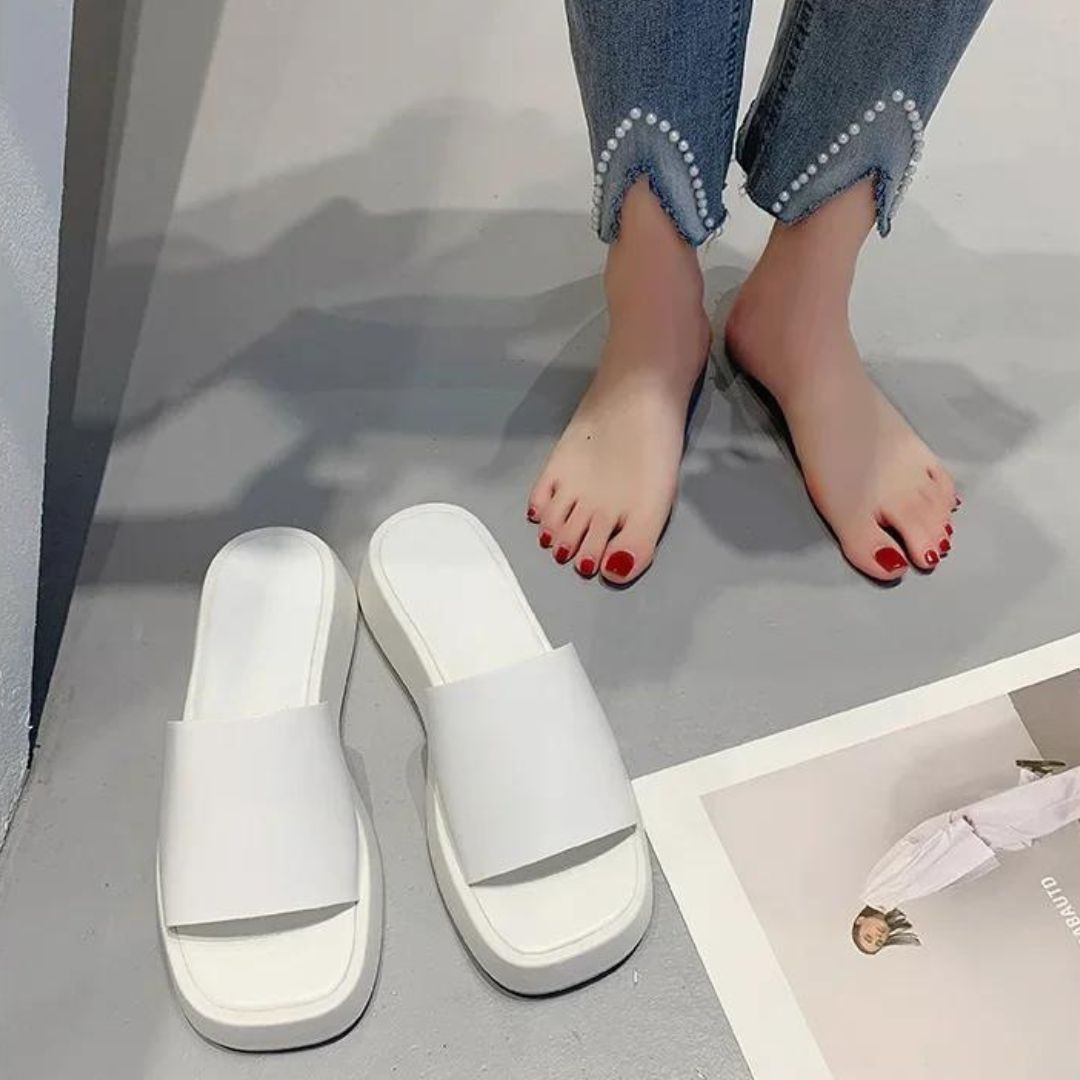 Minimalist slide sandals with wide strap