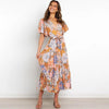 Floral wrap dress in midi length with flutter sleeves