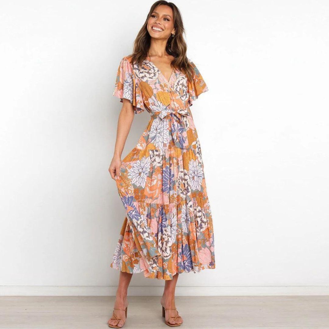 Floral wrap dress in midi length with flutter sleeves