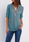 V-neck blouse with zip fastening