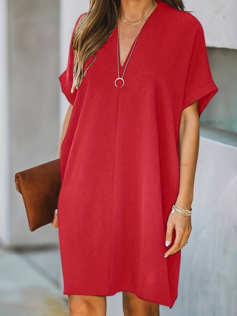 Plunging mini dress with V-neckline