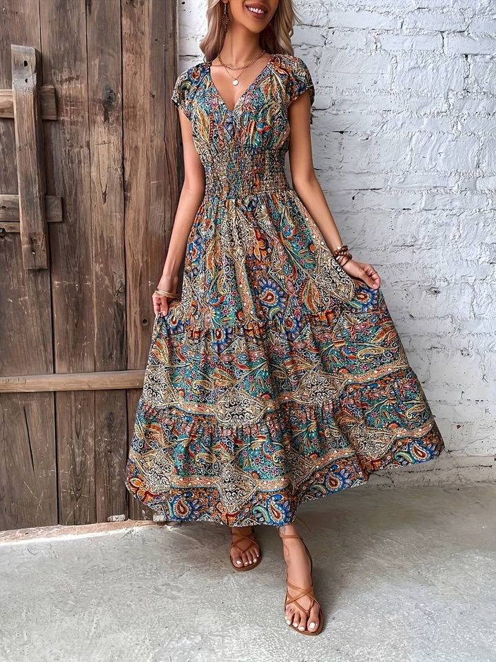 Long dress with ruffled paisley detail