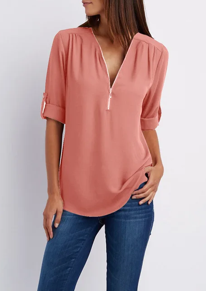 Blouse with V-neck and zip fastening