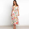 Floral wrap dress in midi length with flutter sleeves