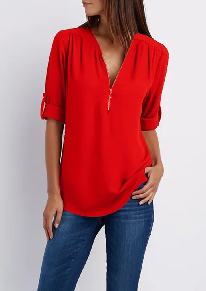 Blouse with V-neck and zip fastening