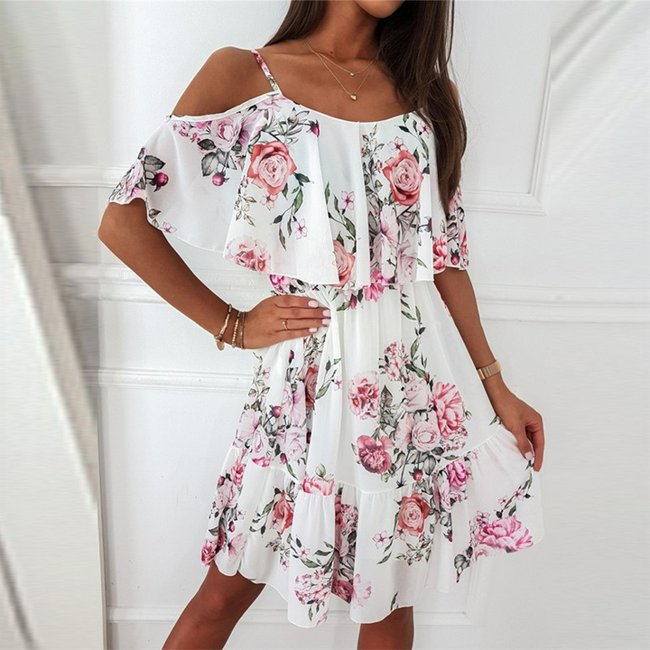 Dress with open shoulders and floral print