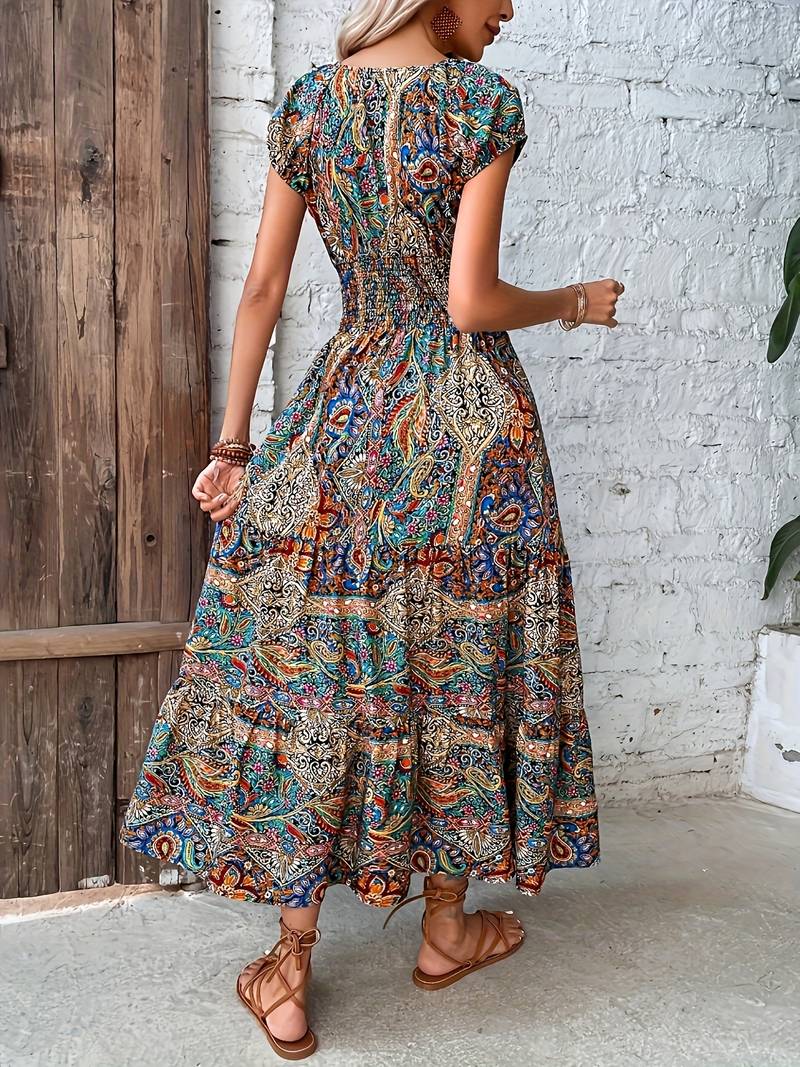 Long dress with ruffled paisley detail