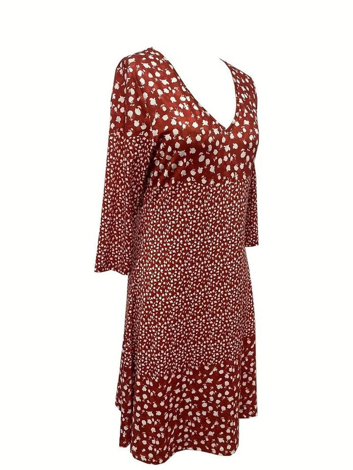 Dotted V-neck dress with floral print