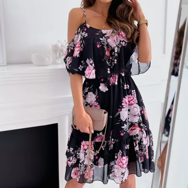 Dress with open shoulders and floral print