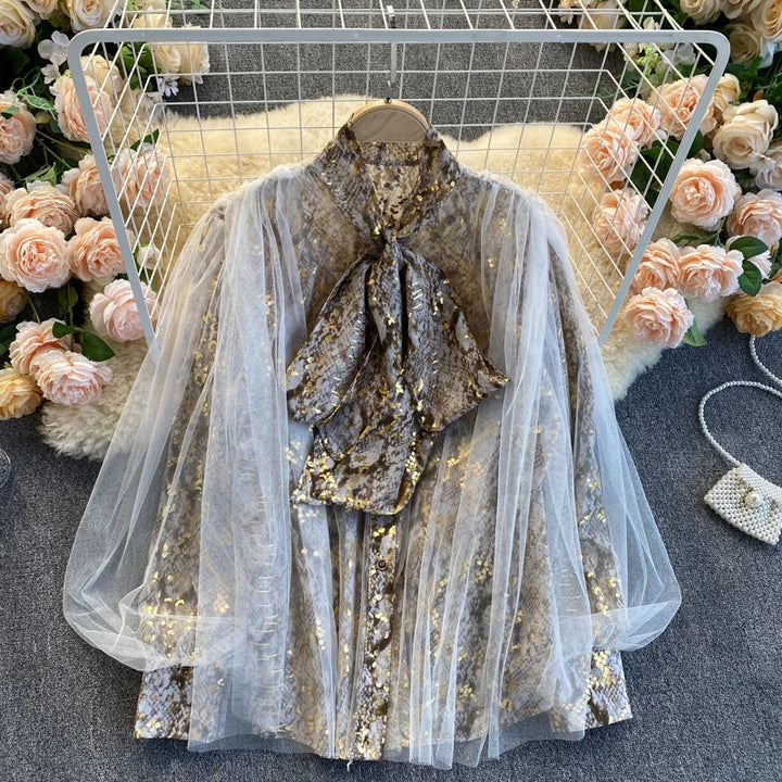 Transparent blouse with lantern sleeves