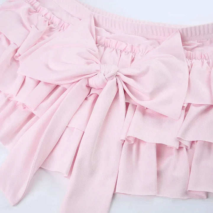 Shorts with ruffled hem and satin bow detail