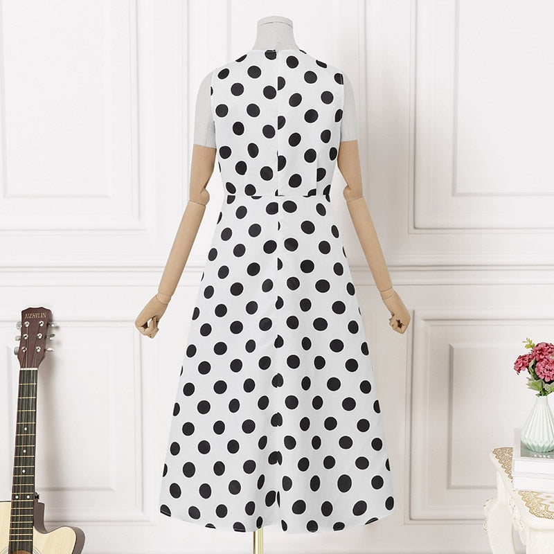 Midi dress with polka dot pattern