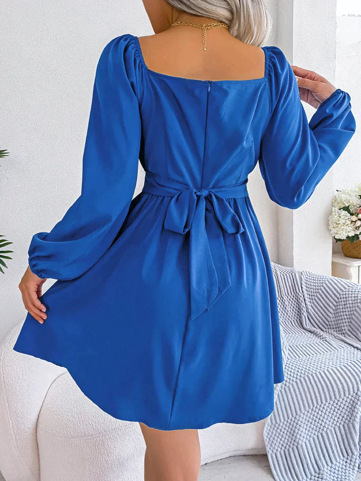 Tailored dress with ruffles