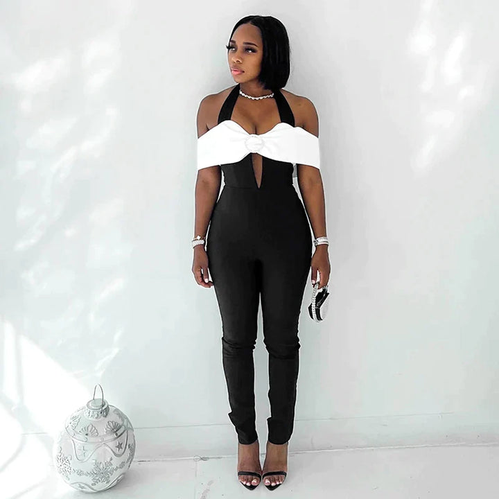 Monochrome jumpsuit with halterneck and bow accent