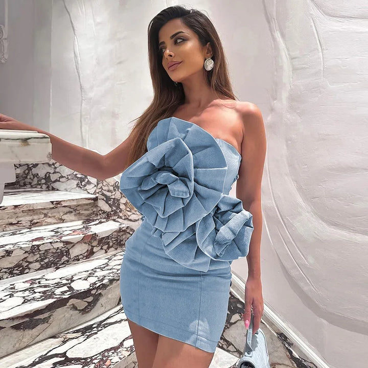 Off-the-shoulder denim mini dress with oversized ruffle