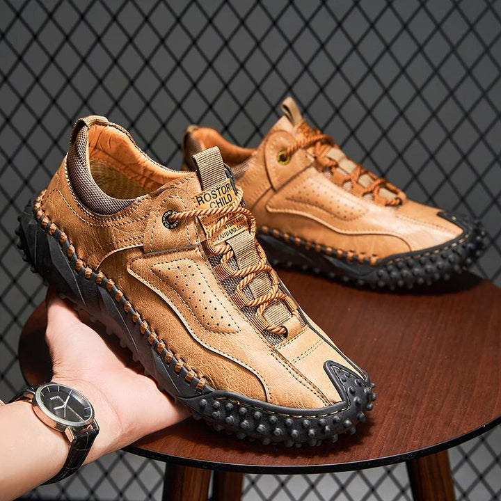 Robust outdoor lace-up shoes with studded tread