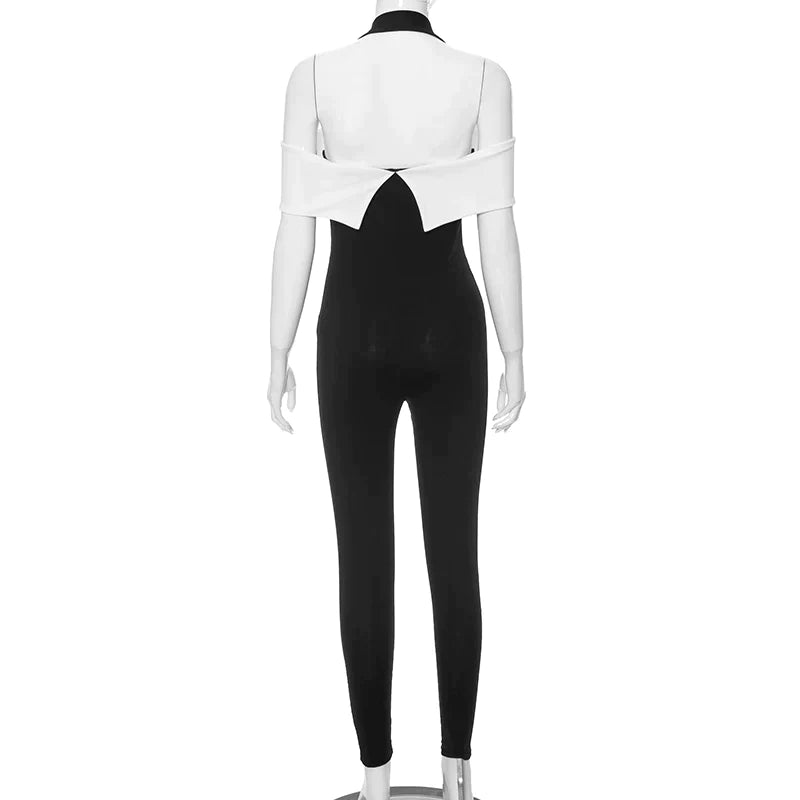 Monochrome jumpsuit with halterneck and bow accent