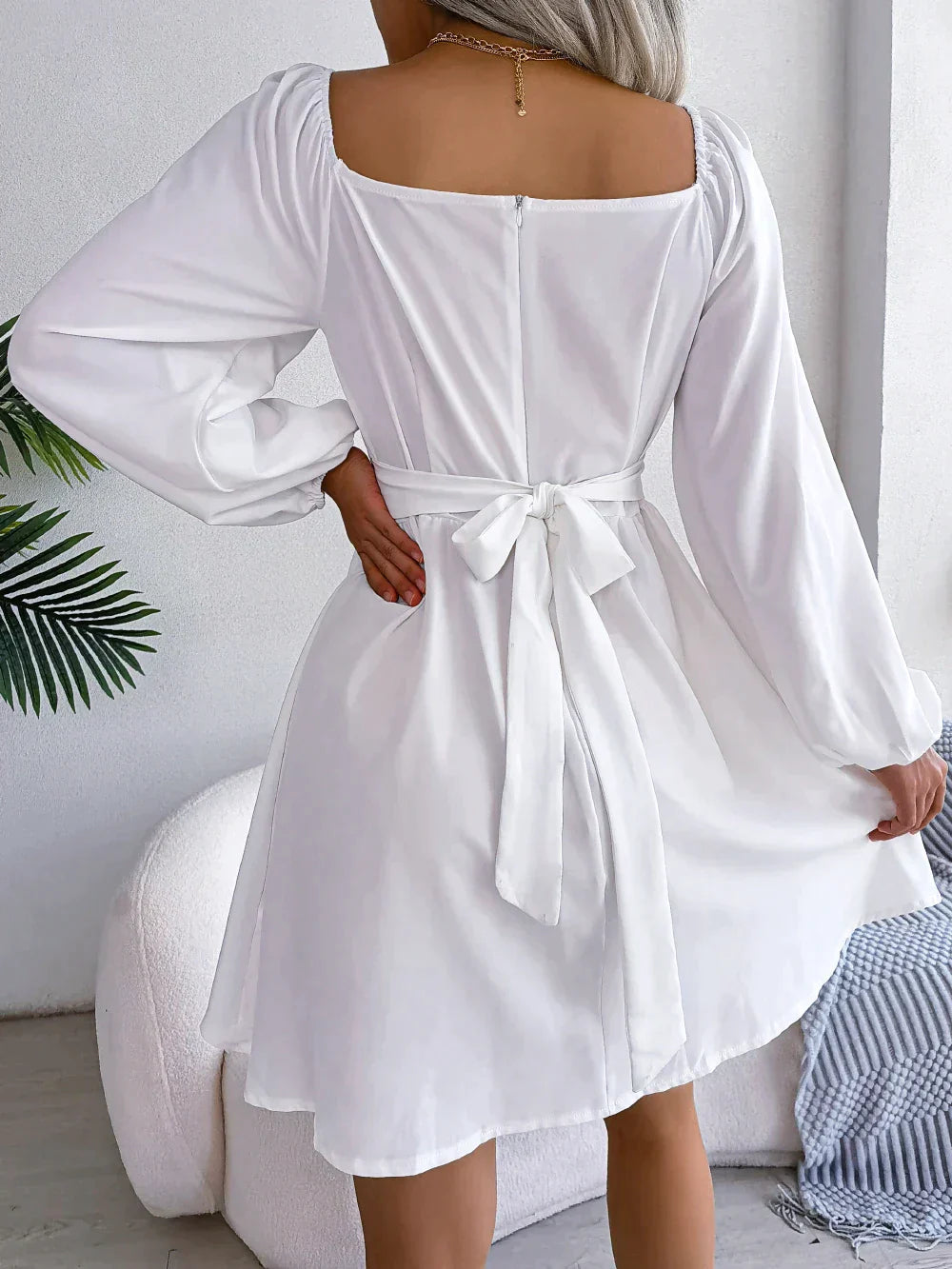 Tailored dress with ruffles