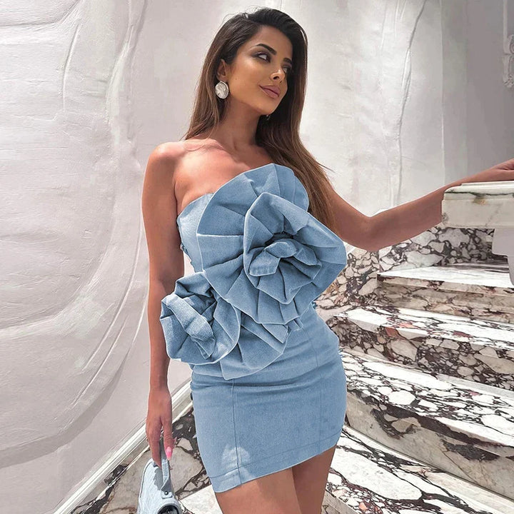 Off-the-shoulder denim mini dress with oversized ruffle