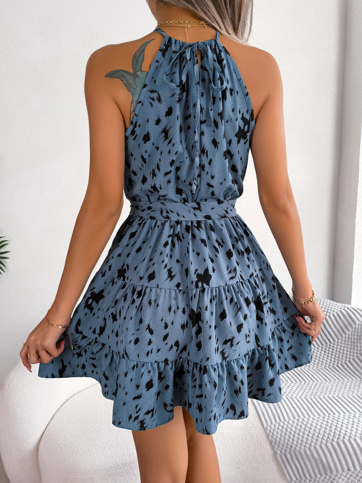 Sleeveless dress with leopard print and ruffles