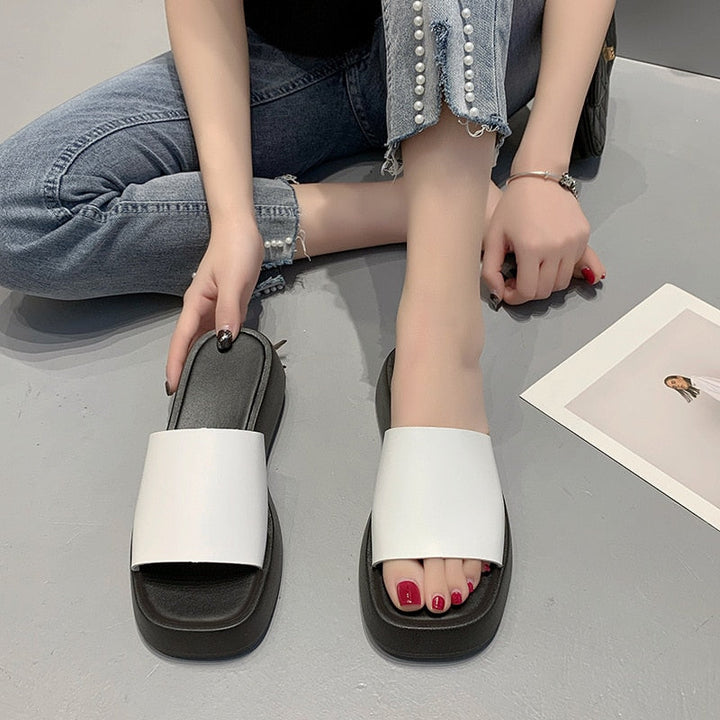 Minimalist slide sandals with wide strap