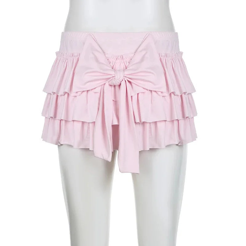 Shorts with ruffled hem and satin bow detail