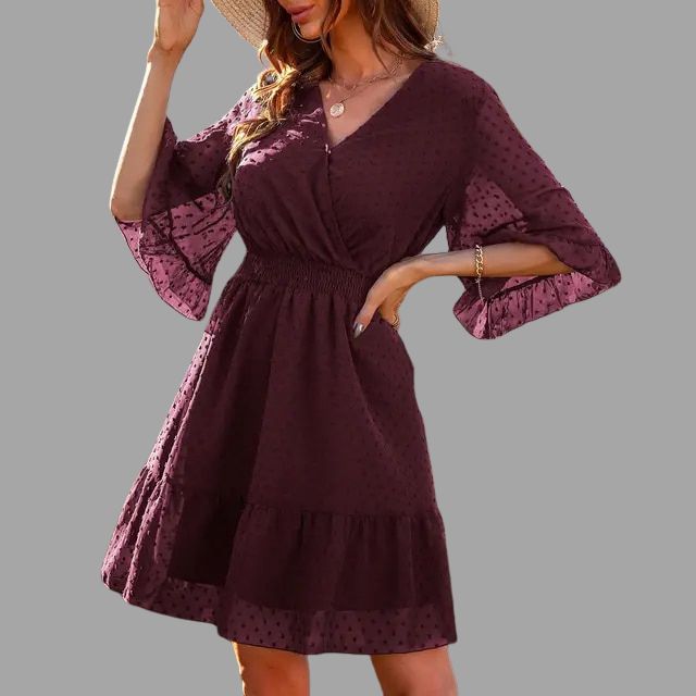 Dotted dress with gathered waist and bell sleeves