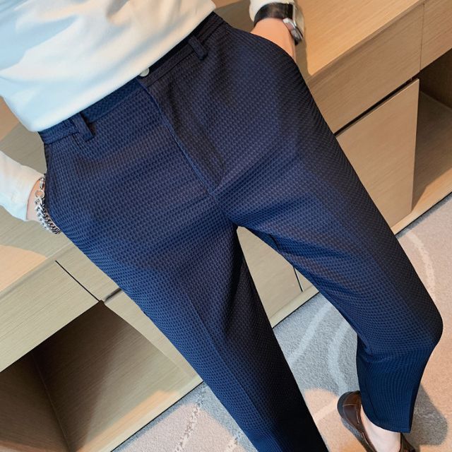 Slim-fit trousers with a subtle checked pattern