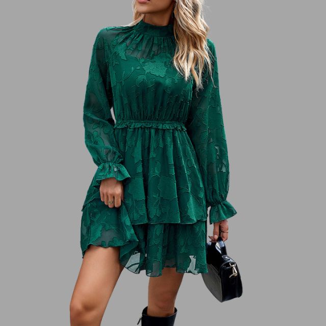 Flowing tiered mini dress with embossed floral detail