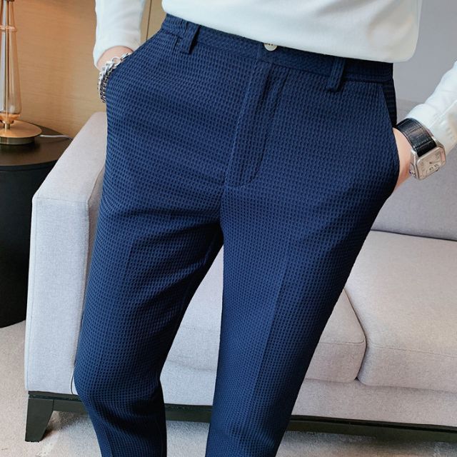 Slim-fit trousers with a subtle checked pattern