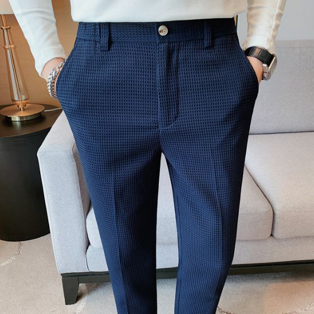 Slim-fit trousers with a subtle checked pattern