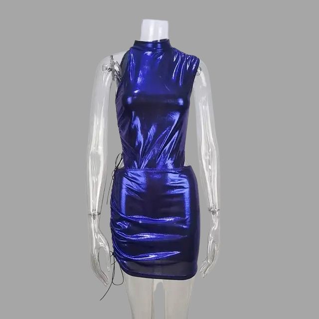 Metallic set comprising a sleeveless top and skirt with cut-out details