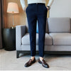 Slim-fit trousers with a subtle checked pattern