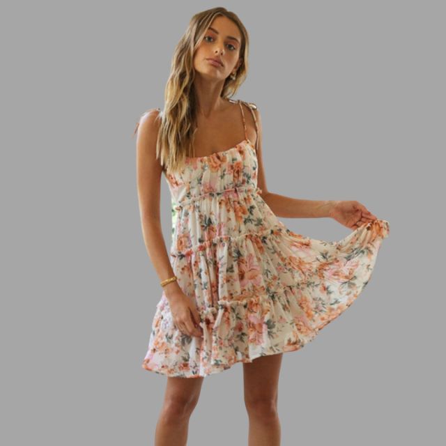 Playful, tiered mini dress with a delicate print