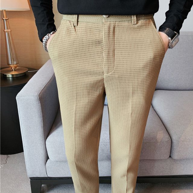 Slim-fit trousers with a subtle checked pattern