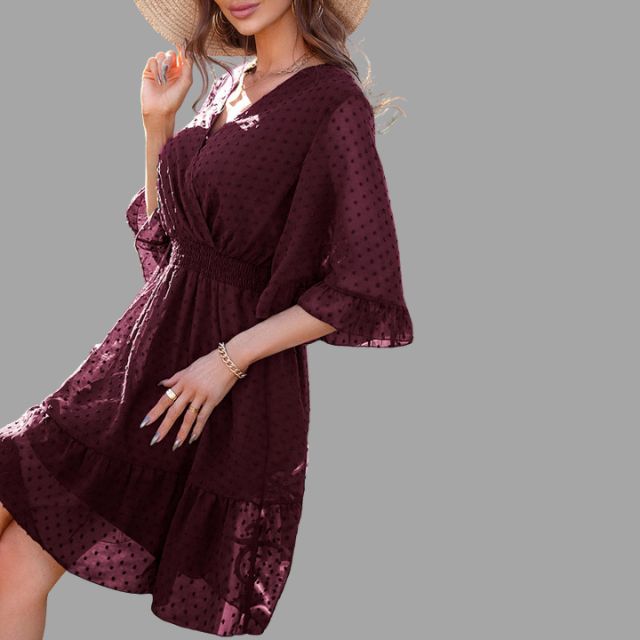 Dotted dress with gathered waist and bell sleeves