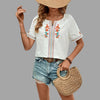 Embroidered boho shirt with tassel trim