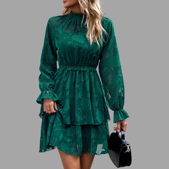 Flowing tiered mini dress with embossed floral detail