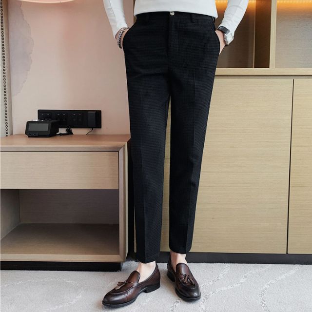 Slim-fit trousers with a subtle checked pattern