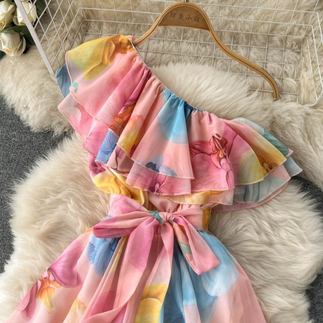 Floral dress with halterneck and ruffle detail