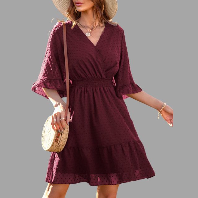 Dotted dress with gathered waist and bell sleeves